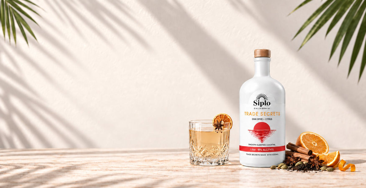 Siplo Trade Secrets bottle with cocktail and ingredients